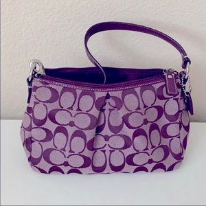 Vintage Genuine leather Coach baguette bag in a deep purple color.